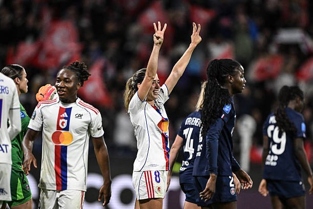 Lyon PSG Rivalry Lyonnes' US midfielder Lindsey Horan (C) celebrates after scoring her team's third goal during the French Premiere Ligue football match between OL Lyonnes (OL) and Paris-Saint-Germain (PSG) at the Groupama Stadium in Decines-Charpieu, central-eastern France on September 27, 2025. (Photo by JEFF PACHOUD / AFP) (Photo by JEFF PACHOUD/AFP via Getty Images)
