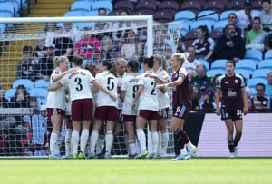 Alessia Russo celebrates scoring for Arsenal against Aston Villa at Villa Park in a 3-0 WSL win.
