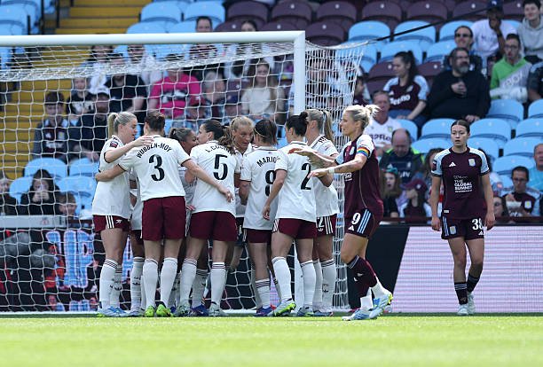 Alessia Russo celebrates scoring for Arsenal against Aston Villa at Villa Park in a 3-0 WSL win.